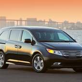 Jigsaw Puzzles Cars Honda Odyssey Game logo