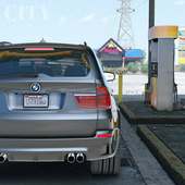 X5M Driving BMW City logo